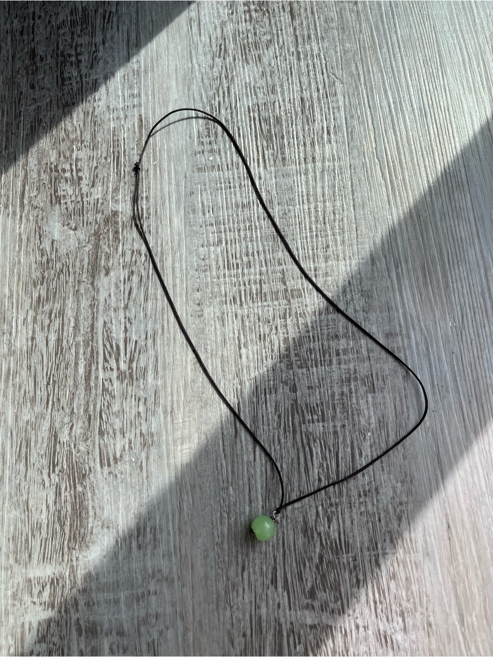 Green Glass Pendant Necklace on Black Cord